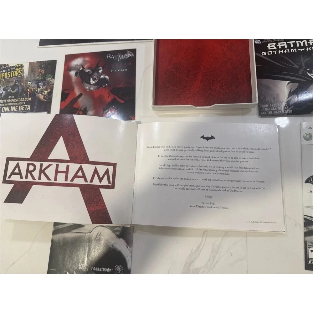 Batman Arkham city Statue Box DVD And Book.  Xbox Game Is Not Included